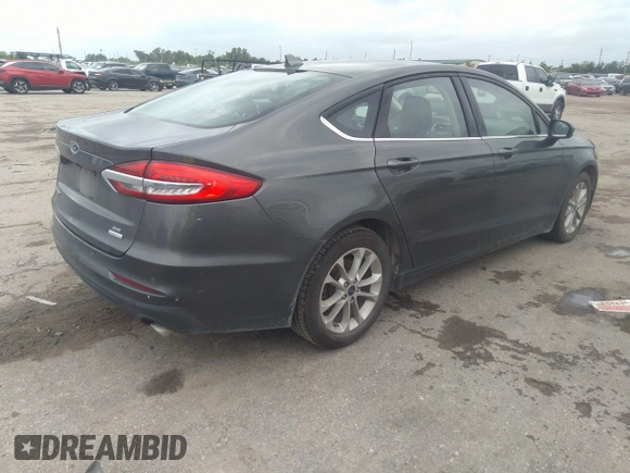 2020 Ford Fusion SE with VIN 3FA6P0HD8LR230263, listed as a IAAI auction lot 42069350 with 76,936 mi miles and . Bid and sale history available at DreamBid. Image 4.