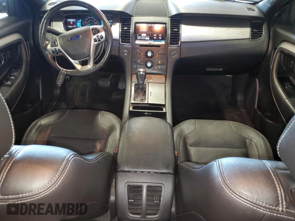 2015 Ford Taurus SEL with VIN 1FAHP2E83FG143653, listed as a Copart auction lot 59280645 with 77,048 mi miles and Salvage title. Bid and sale history available at DreamBid. Image 8.