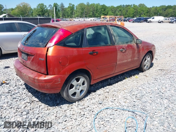 2005 Ford Focus S with VIN 3FAFP37N85R113281, listed as a IAAI auction lot 42037187 with Not Provided miles and . Bid and sale history available at carsss.com. Image 4.