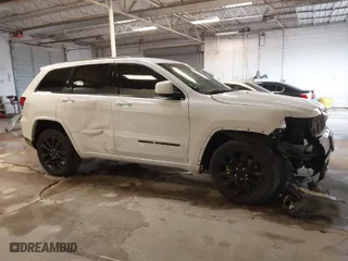 2021 Jeep Grand Cherokee Laredo X with VIN 1C4RJFAG6MC857933, listed as a IAAI auction lot 41358515 with 71,580 mi miles. Bid and sale history available at carsss.com. Image 13.