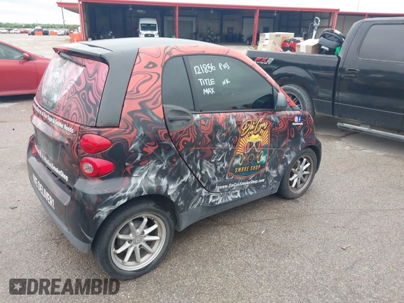 2008 Smart fortwo Pure z VIN WMEEJ31X28K121856, wystawiony jako IAAI lot #41944211 z przebiegiem 90 140 mil mil oraz . Historia ofert i sprzedaży dostępna na DreamBid. Obrazek 4.