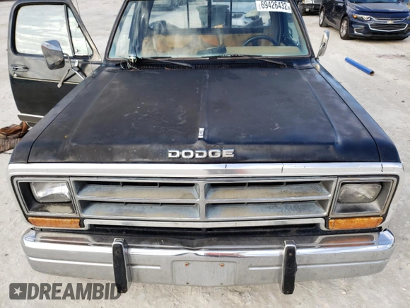1986 Dodge Trucks z VIN 1B7HD14TXGS016934, wystawiony jako Copart lot #69426432 z przebiegiem 333 mil mil oraz Szkody całkowita. Historia ofert i sprzedaży dostępna na DreamBid. Obrazek 11.