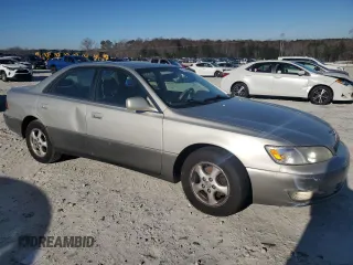 1998 Lexus ES 300 Luxury Sport Sdn with VIN JT8BF28G3W5046338, listed as a Copart auction lot 85040954 with 254,104 mi miles and Salvage Title. Bid and sale history available at carsss.com. Image 4.