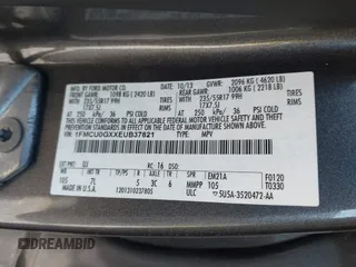 2014 Ford Escape SE with VIN 1FMCU0GXXEUB37821, listed as a IAAI auction lot 41853052 with 197,773 mi miles. Bid and sale history available at carsss.com. Image 9.