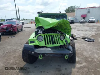 2004 Jeep Wrangler Sahara z VIN 1J4FA59S44P704878, wystawiony jako IAAI lot #42226255 z przebiegiem 88 886 mil mil oraz . Historia ofert i sprzedaży dostępna na DreamBid. Obrazek 13.