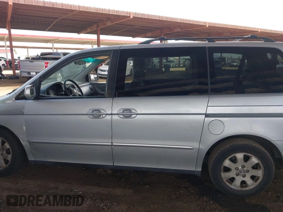 2002 Honda Odyssey EX with VIN 5FNRL18662B034817, listed as a IAAI auction lot 42359186 with 209,348 mi miles and . Bid and sale history available at DreamBid. Image 14.