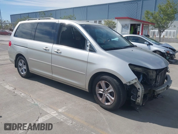 2009 Honda Odyssey Touring с VIN 5FNRL38969B013708, выставлен на аукционе IAAI как лот 42002538 с пробегом 198 220 миль миль и . История ставок и продаж доступна на DreamBid. Изображение 1.