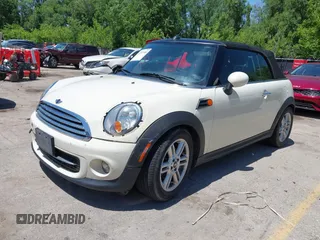 2012 MINI Convertible with VIN WMWZN3C51CT134646, listed as a IAAI auction lot 42252740 with 124,278 mi miles and . Bid and sale history available at DreamBid. Image 2.