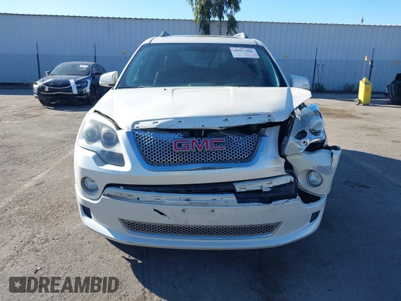 2011 GMC Acadia Denali z VIN 1GKKRTED0BJ334817, wystawiony jako IAAI lot #40957886 z przebiegiem 186 093 mil mil oraz . Historia ofert i sprzedaży dostępna na DreamBid. Obrazek 12.