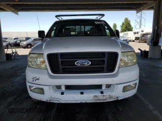 2004 Ford F-150 STX с VIN 1FTRX12W44NA47003, выставлен на аукционе Copart как лот 61133075 с пробегом 258 417 миль миль и Списание • Salvage title. История ставок и продаж доступна на DreamBid. Изображение 5.