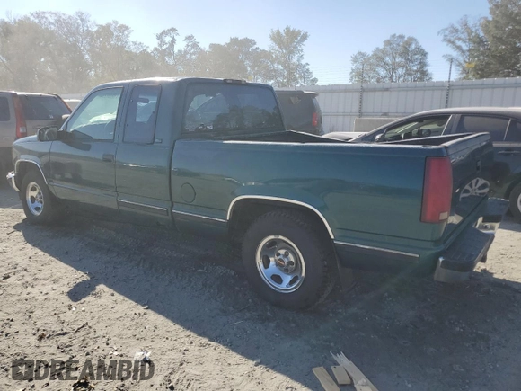 1996 GMC Sierra 1500 with VIN 2GTEC19W4T1542916, listed as a Copart auction lot 75097274 with 310,745 mi miles and Salvage Title. Bid and sale history available at DreamBid. Image 2.