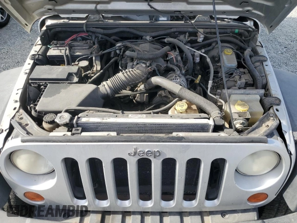 2007 Jeep Wrangler Unlimited X with VIN 1J8GB39157L142982, listed as a Copart auction lot 82050134 with 72,666 mi miles and Salvage Title. Bid and sale history available at DreamBid. Image 11.