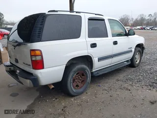 2003 Chevrolet Tahoe LT with VIN 1GNEC13Z63J126611, listed as a IAAI auction lot 41300437 with 313,885 mi miles. Bid and sale history available at carsss.com. Image 4.
