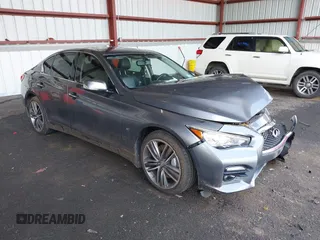 2015 Infiniti Q50 Premium z VIN JN1BV7AR3FM422042, wystawiony jako IAAI lot #42258784 z przebiegiem 72 030 mil mil oraz . Historia ofert i sprzedaży dostępna na DreamBid. Obrazek 1.