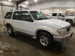 2000 Ford Explorer Eddie Bauer z VIN 1FMDU84P0YZC67167, wystawiony jako Copart lot #85806684 z przebiegiem 156 411 mil mil oraz Szkoda całkowita • Salvage title. Historia ofert i sprzedaży dostępna na DreamBid. Obrazek 4.