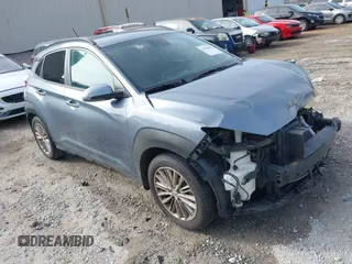 2021 Hyundai Kona SEL with VIN KM8K22AA5MU655335, listed as a IAAI auction lot 41464402 with 74,384 mi miles. Bid and sale history available at carsss.com. Image 1.