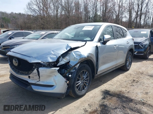 2020 Mazda CX-5 Touring with VIN JM3KFBCM3L0791816, listed as a IAAI auction lot 41761623 with 87,742 mi miles and . Bid and sale history available at carsss.com. Image 2.