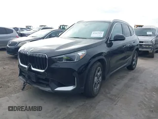 2023 BMW X1 xDrive28i with VIN WBX73EF04P5W37659, listed as a IAAI auction lot 42167511 with 36,820 mi miles and . Bid and sale history available at DreamBid. Image 2.