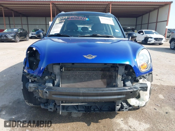 2015 MINI Countryman with VIN WMWZB3C56FWR43443, listed as a IAAI auction lot 41920848 with 91,192 mi miles and . Bid and sale history available at DreamBid. Image 13.