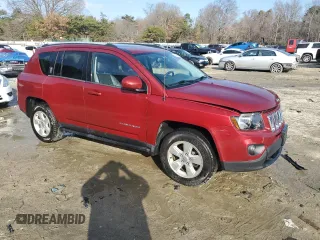 2016 Jeep Compass Latitude with VIN 1C4NJCEB7GD543444, listed as a Copart auction lot 84266844 with 61,564 mi miles and Salvage Title. Bid and sale history available at carsss.com. Image 4.