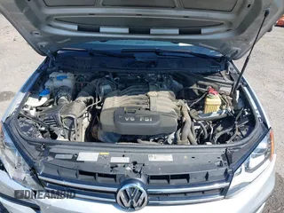 2014 Volkswagen Touareg Sport with VIN WVGEF9BP6ED007436, listed as a IAAI auction lot 41953307 with 114,925 mi miles and . Bid and sale history available at DreamBid. Image 10.