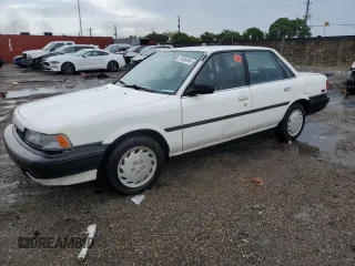 1991 Toyota Camry z VIN JT2SV21E2M3435406, wystawiony jako Copart lot #74958494 z przebiegiem 127 580 mil mil oraz Szkoda całkowita • Salvage title. Historia ofert i sprzedaży dostępna na DreamBid. Obrazek 1.