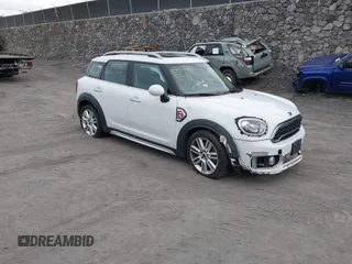 2017 MINI Countryman Cooper S with VIN WMZYT3C33H3D97895, listed as a IAAI auction lot 41448401 with 59,500 mi miles and . Bid and sale history available at DreamBid. Image 1.