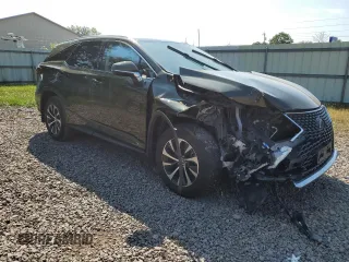 2021 Lexus RX with VIN JTJHZKFA8M2033856, listed as a Copart auction lot 70485624 with 51,562 mi miles and Salvage Title. Bid and sale history available at carsss.com. Image 4.