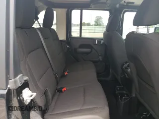 2023 Jeep Wrangler Sport z VIN 1C4HJXDG0PW626106, wystawiony jako Copart lot #62696574 z przebiegiem 16 207 mil mil oraz Szkoda całkowita • Salvage title. Historia ofert i sprzedaży dostępna na DreamBid. Obrazek 11.