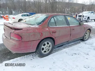1999 Oldsmobile Intrigue GL z VIN 1G3WS52KXXF335273, wystawiony jako IAAI lot #41624543 z przebiegiem 106 606 mil mil oraz . Historia ofert i sprzedaży dostępna na DreamBid. Obrazek 4.