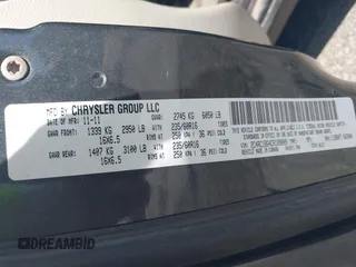 2012 Chrysler Town & Country Touring with VIN 2C4RC1BG4CR189809, listed as a IAAI auction lot 42093962 with 180,324 mi miles. Bid and sale history available at carsss.com. Image 9.