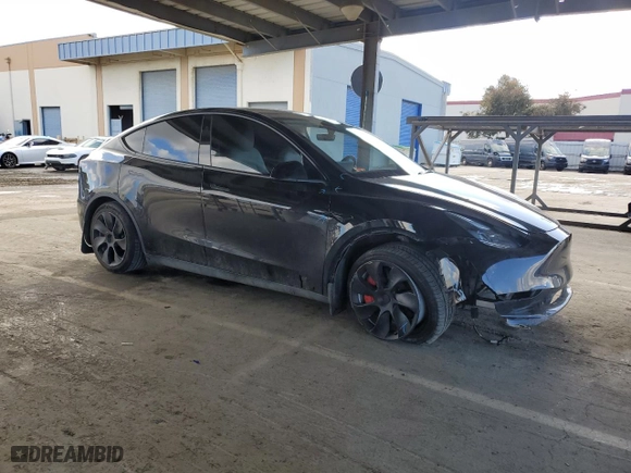 2023 Tesla Model Y Long Range with VIN 7SAYGDEE3PF938230, listed as a Copart auction lot 47883385 with 28,461 mi miles and Salvage Title. Bid and sale history available at carsss.com. Image 4.