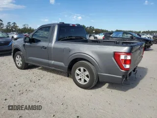 2023 Ford F-150 XL with VIN 1FTMF1C53PKG19476, listed as a Copart auction lot 82777404 with 14,278 mi miles and Clean Title. Bid and sale history available at carsss.com. Image 2.