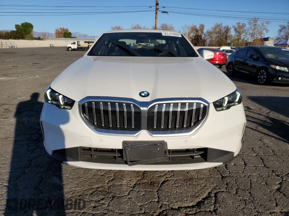 2024 BMW 5 Series 530i with VIN WBA43FJ0XRCS05943, listed as a Copart auction lot 87277084 with 4,924 mi miles and Salvage Title. Bid and sale history available at carsss.com. Image 5.