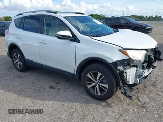2018 Toyota RAV4 XLE with VIN JTMWFREV7JJ174483, listed as a IAAI auction lot 41597797 with 82,836 mi miles. Bid and sale history available at carsss.com. Image 1.