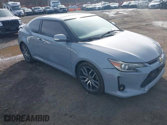 2014 Scion tC z VIN JTKJF5C71E3081033, wystawiony jako IAAI lot #41928949 z przebiegiem 144 112 mil mil oraz . Historia ofert i sprzedaży dostępna na DreamBid. Obrazek 1.