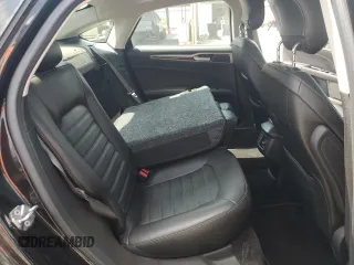 2013 Ford Fusion SE z VIN 3FA6P0H97DR215735, wystawiony jako Copart lot #62326335 z przebiegiem 100 312 mil mil oraz Szkoda całkowita • Salvage title. Historia ofert i sprzedaży dostępna na DreamBid. Obrazek 10.