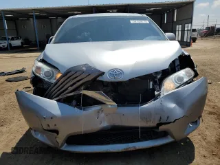 2017 Toyota Sienna XLE with VIN 5TDDZ3DC3HS177700, listed as a Copart auction lot 59720215 with 124,180 mi miles and Salvage title. Bid and sale history available at DreamBid. Image 5.