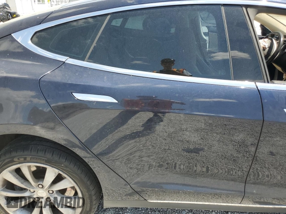 2014 Tesla Model S 60 with VIN 5YJSA1S12EFP29885, listed as a Copart auction lot 59769215 with Not provided miles and Salvage title. Bid and sale history available at DreamBid. Image 10.