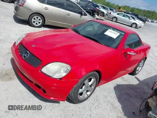 2002 Mercedes-Benz SLK 320 z VIN WDBKK65F22F254147, wystawiony jako IAAI lot #42017888 z przebiegiem 100 094 mil mil oraz . Historia ofert i sprzedaży dostępna na DreamBid. Obrazek 2.