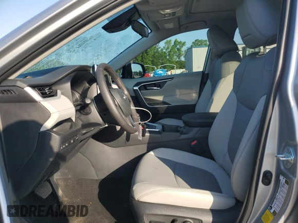 2024 Toyota RAV4 Hybrid XLE Premium z VIN 2T3B6RFV0RW074218, wystawiony jako Copart lot #56917295 z przebiegiem 14 969 mil mil oraz Szkoda całkowita • Salvage title. Historia ofert i sprzedaży dostępna na DreamBid. Obrazek 7.