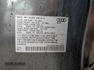 2015 Audi Q7 Premium Plus z VIN WA1LGAFE3FD029618, wystawiony jako Copart lot #58665605 z przebiegiem 146 148 mil mil oraz Czysty tytuł • Clean title. Historia ofert i sprzedaży dostępna na DreamBid. Obrazek 13.