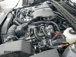 2025 Toyota Camry LE with VIN 4T1DAACKXSU594203, listed as a IAAI auction lot 43301401 with 16,302 mi miles and . Bid and sale history available at DreamBid. Image 19.