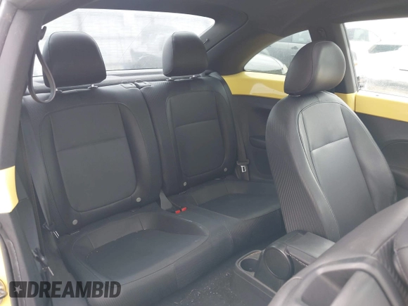 2013 Volkswagen Beetle 2.5L with VIN 3VWHX7AT7DM604449, listed as a IAAI auction lot 42406666 with 104,874 mi miles and . Bid and sale history available at DreamBid. Image 8.