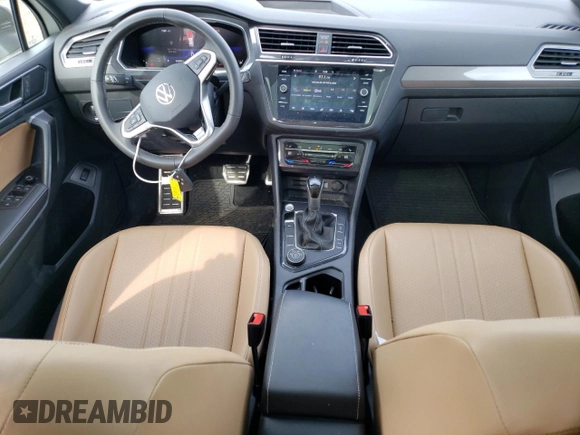 2023 Volkswagen Tiguan SE R-Line Black with VIN 3VV8B7AX9PM092316, listed as a Copart auction lot 51892325 with 24,058 mi miles and Salvage title. Bid and sale history available at DreamBid. Image 8.