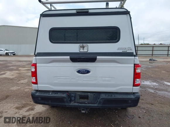 2021 Ford F-150 XL with VIN 1FTMF1CB4MKD85219, listed as a IAAI auction lot 42034028 with 115,415 mi miles and . Bid and sale history available at DreamBid. Image 16.