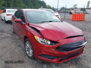 2017 Ford Fusion Hybrid SE with VIN 3FA6P0LU1HR238283, listed as a IAAI auction lot 42233496 with 123,452 mi miles and . Bid and sale history available at DreamBid. Image 1.