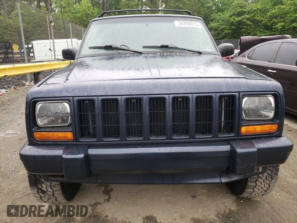 1997 Jeep Cherokee Country with VIN 1J4FJ78S4VL589852, listed as a Copart auction lot 56294015 with 189,530 mi miles and Salvage title. Bid and sale history available at DreamBid. Image 5.