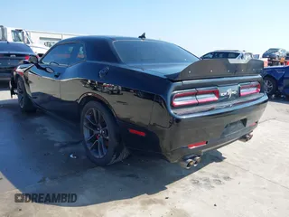 2021 Dodge Challenger R/T Scat Pack z VIN 2C3CDZFJXMH509833, wystawiony jako IAAI lot #41516858 z przebiegiem 66 880 mil mil oraz . Historia ofert i sprzedaży dostępna na DreamBid. Obrazek 3.
