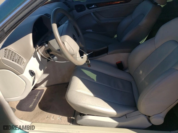 1999 Mercedes-Benz CLK-Class with VIN WDBLJ65G4XF071095, listed as a Copart auction lot 72080064 with 97,558 mi miles and Salvage Title. Bid and sale history available at carsss.com. Image 7.